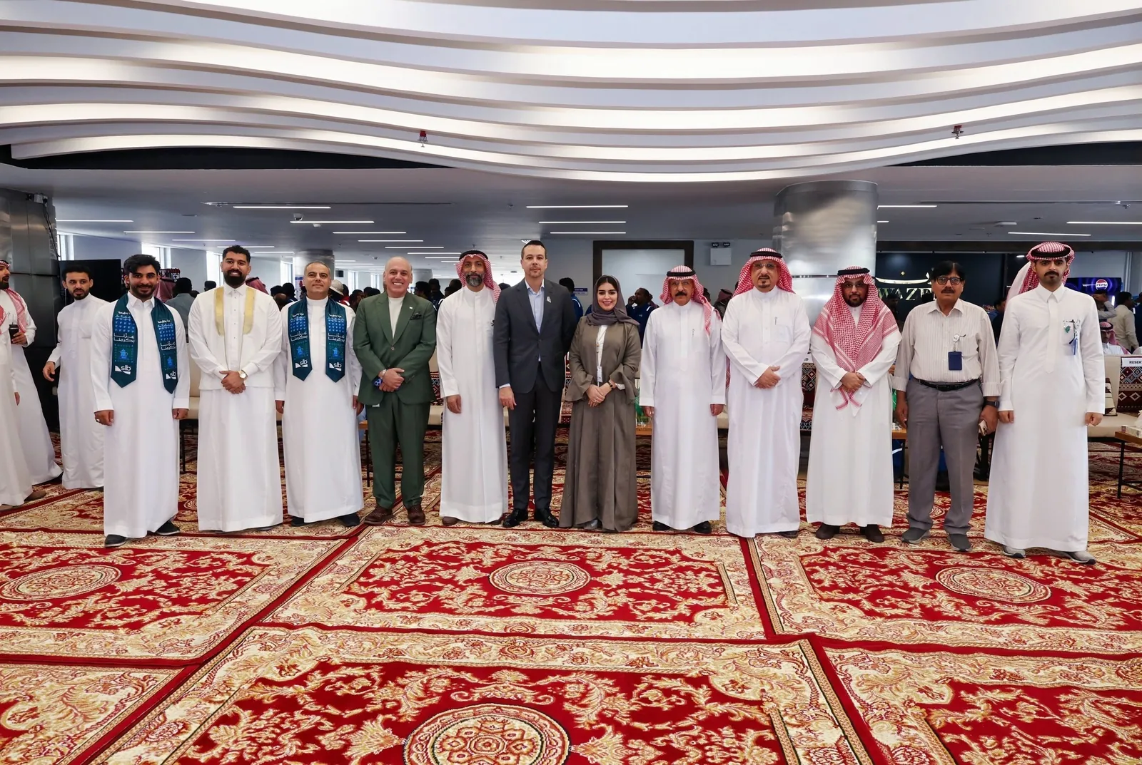 Executive line-up group photo on majlis carpets