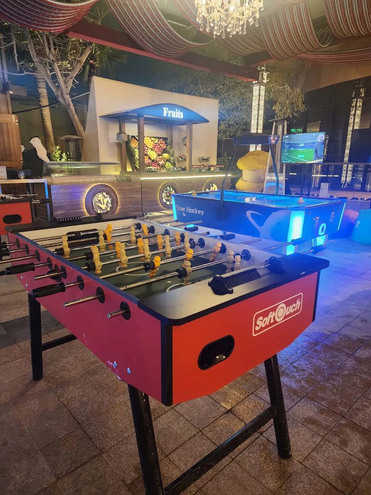 Foosball table in lit Ramadan tent